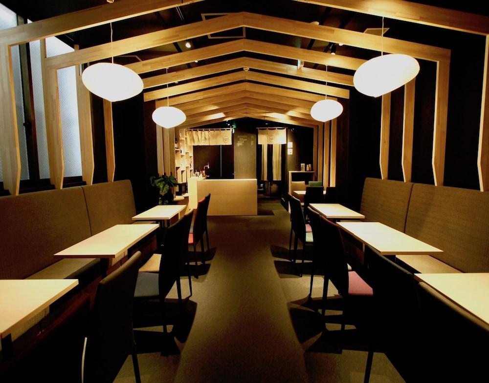 Qoo Hotel *